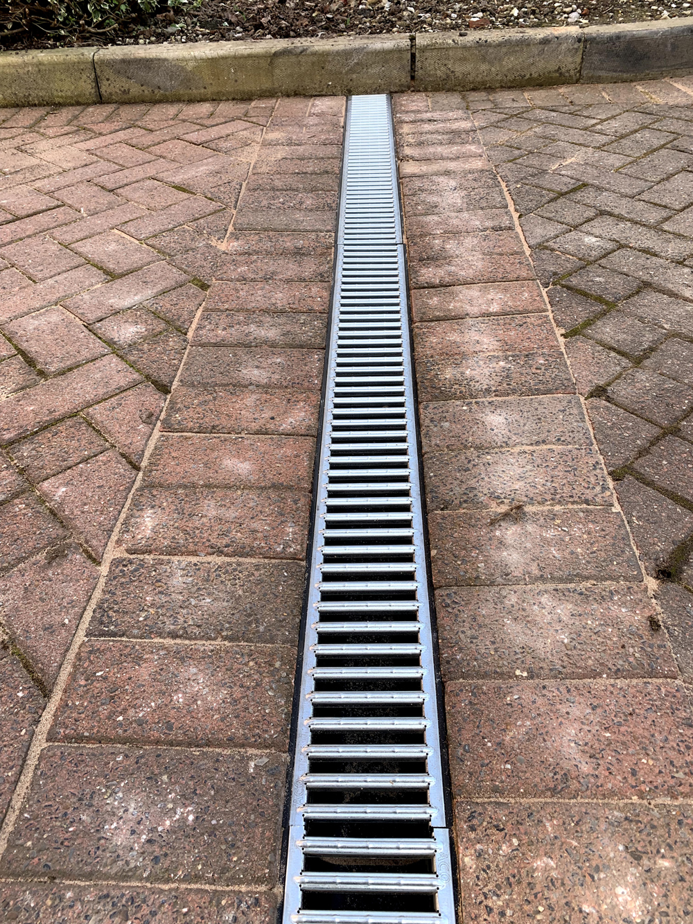 Driveway drain channel installation at an apartment block 3