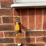 Garden tap and hose real installed