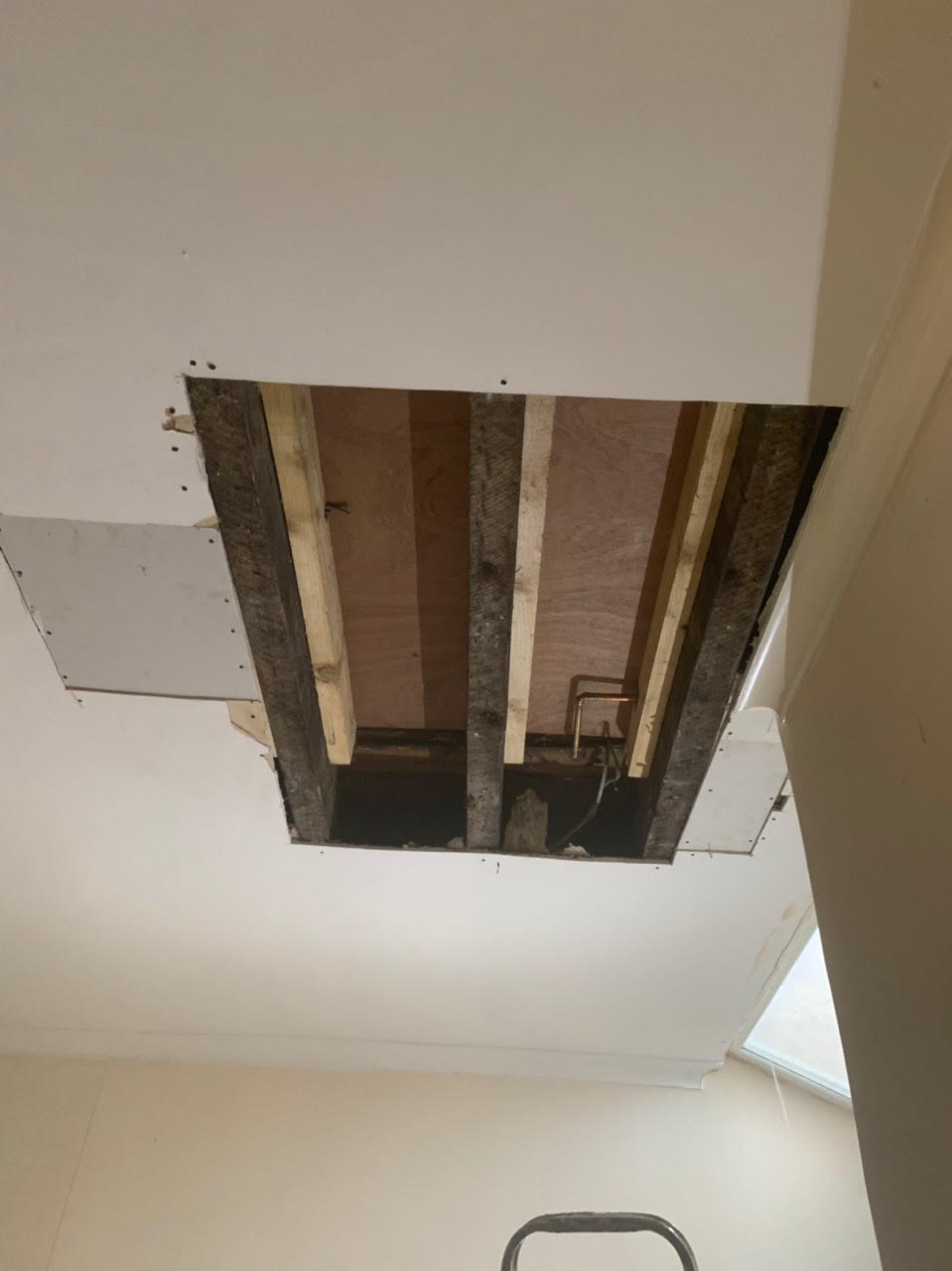 Water damaged ceiling due to a leak 4